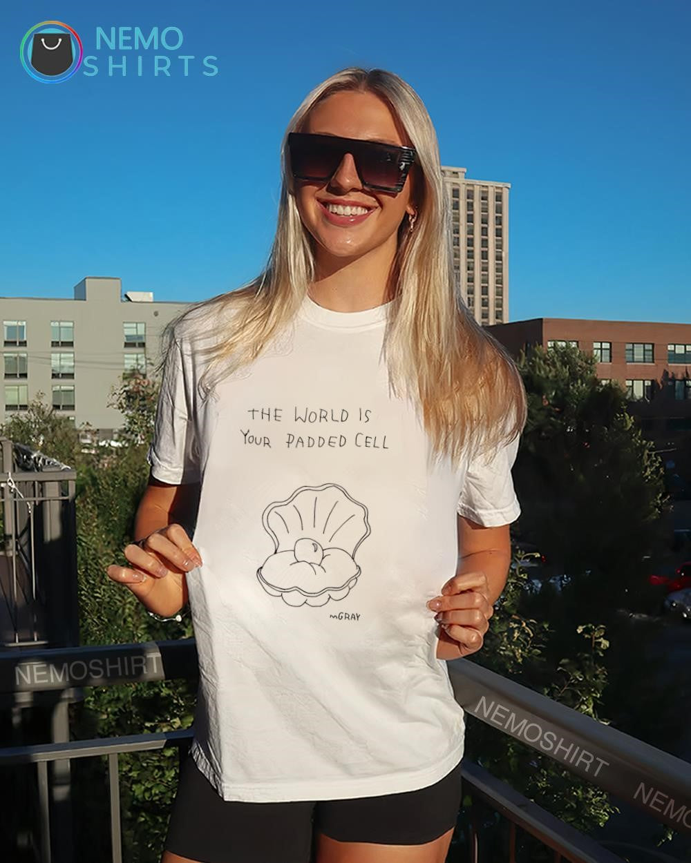 Clam shell pearl the world is your padded cell shirt
