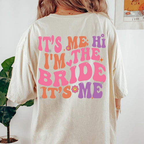 IT'S ME HI IM THE BRIDE SHIRT (COMFORT COLORS T-SHIRT, CASUAL SHIRT UNISEX, BRIDE T-SHIRT) Comfortable Fit Top Womenswear...
