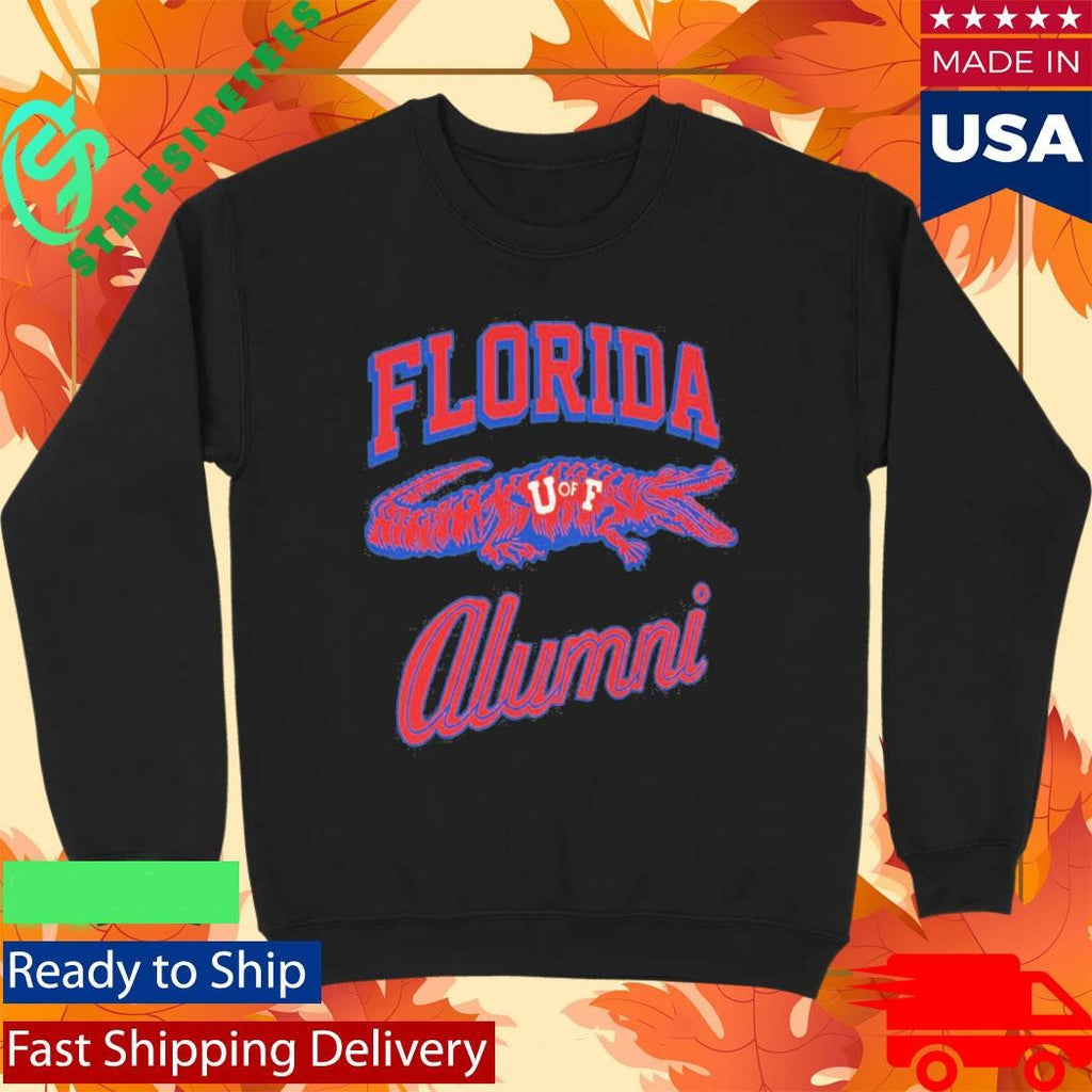 Tim Tebow Wearing University Of Florida Alumni Shirt